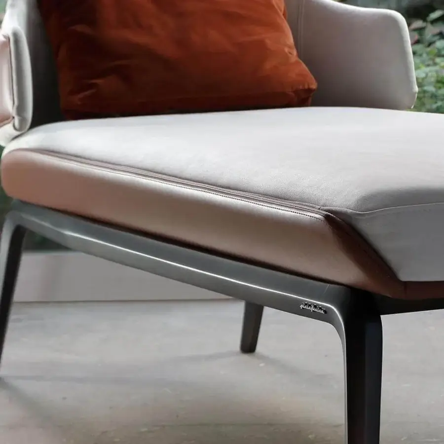 Lavish Reflex Vela chaise lounge crafted in lacquered wood with light gray leather upholstery and brown trim