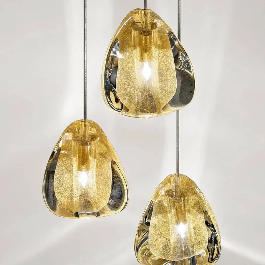 Exclusive Terzani Mizu suspension lamp with glossy gold and black teardrop-shaped handcrafted crystal shade