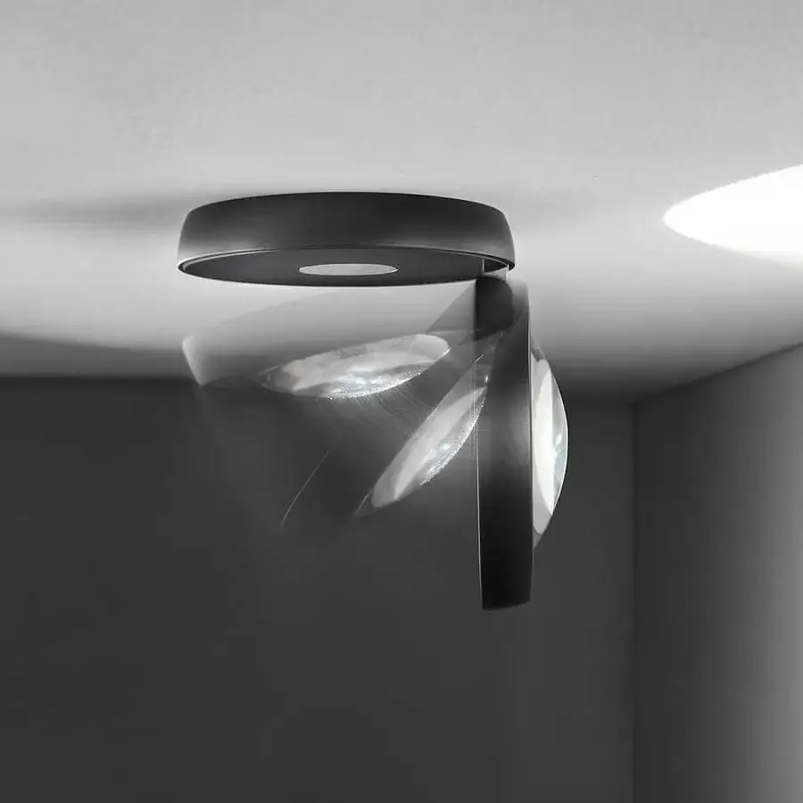Elegant Lodes Nautilus ceiling lamp with adjustable head crafted in matte dark gray metal and glossy finish