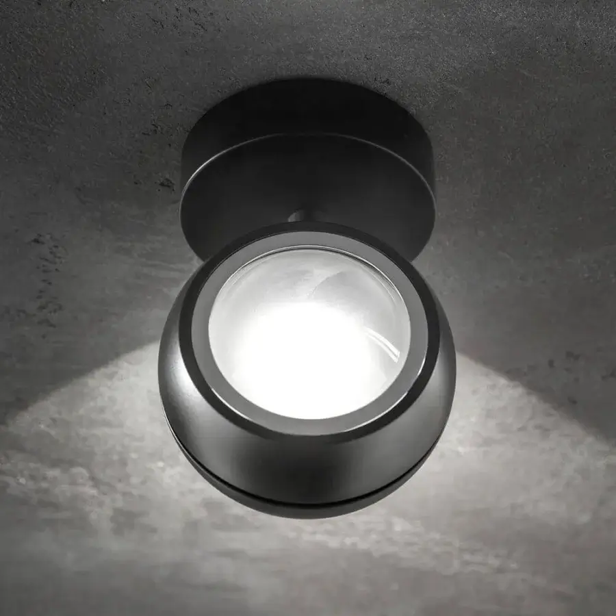 Exceptional Lodes Nautilus Mini wall lamp with black metal and bright white globe crafted for focused light