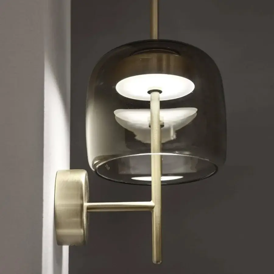 Distinguished Vistosi Jube wall lamp crafted in Italy with smoky grey blown glass and matte gold metal parts