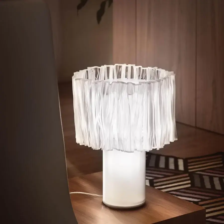 Superior Slamp Accordeon table lamp with a unique frilled lampshade crafted in bright white hand-moulded Lentiflex®