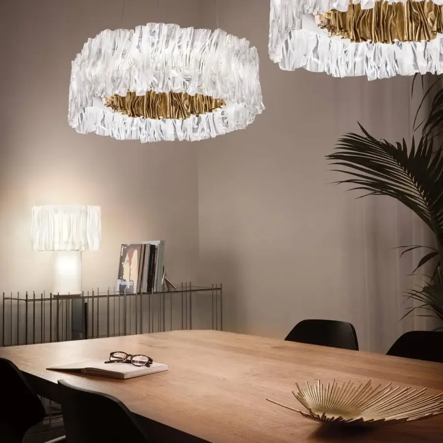 Sophisticated Slamp Accordeon table lamp with a white Lentiflex® shade crafted for a soft diffused glow
