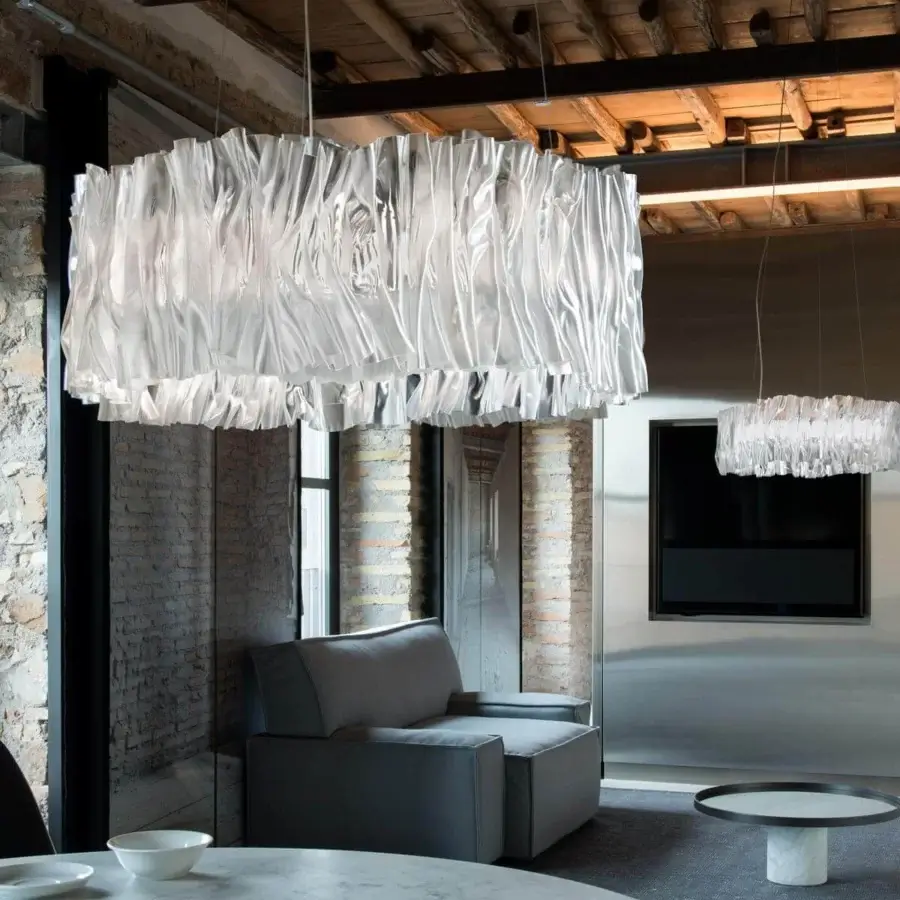 Innovative Slamp Accordeon suspension lamp with translucent hand-moulded Lentiflex® diffuser and flowing organic lines