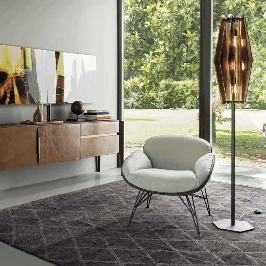Exquisite Arketipo Juno lounge chair in light gray textile and darker outer shell with angled black metal base