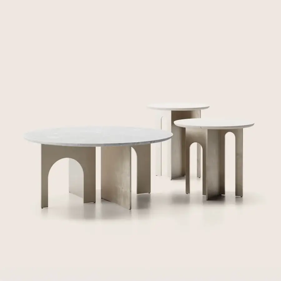 Luxury Paolo Castelli coffee table featuring cross shaped base in champagne satin finished metal and natural ivory polished stone top