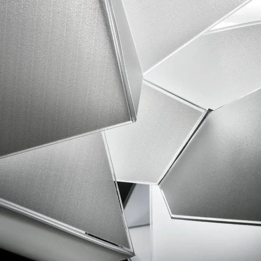 Avant-garde Slamp Cordoba suspension lamp crafted in white and silver techno-polymer with dis-articulated panels diffusing bright illumination