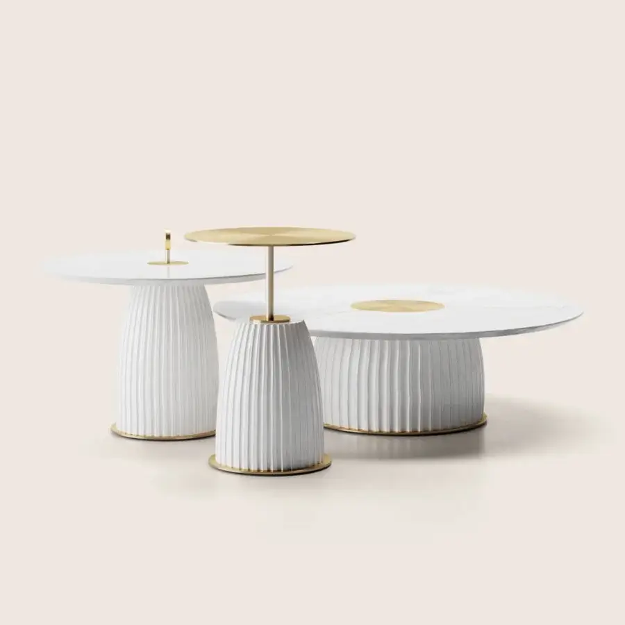 Sophisticated Paolo Castelli Dione side table with fluted ceramic base and white Carrara marble top in brushed gold trim