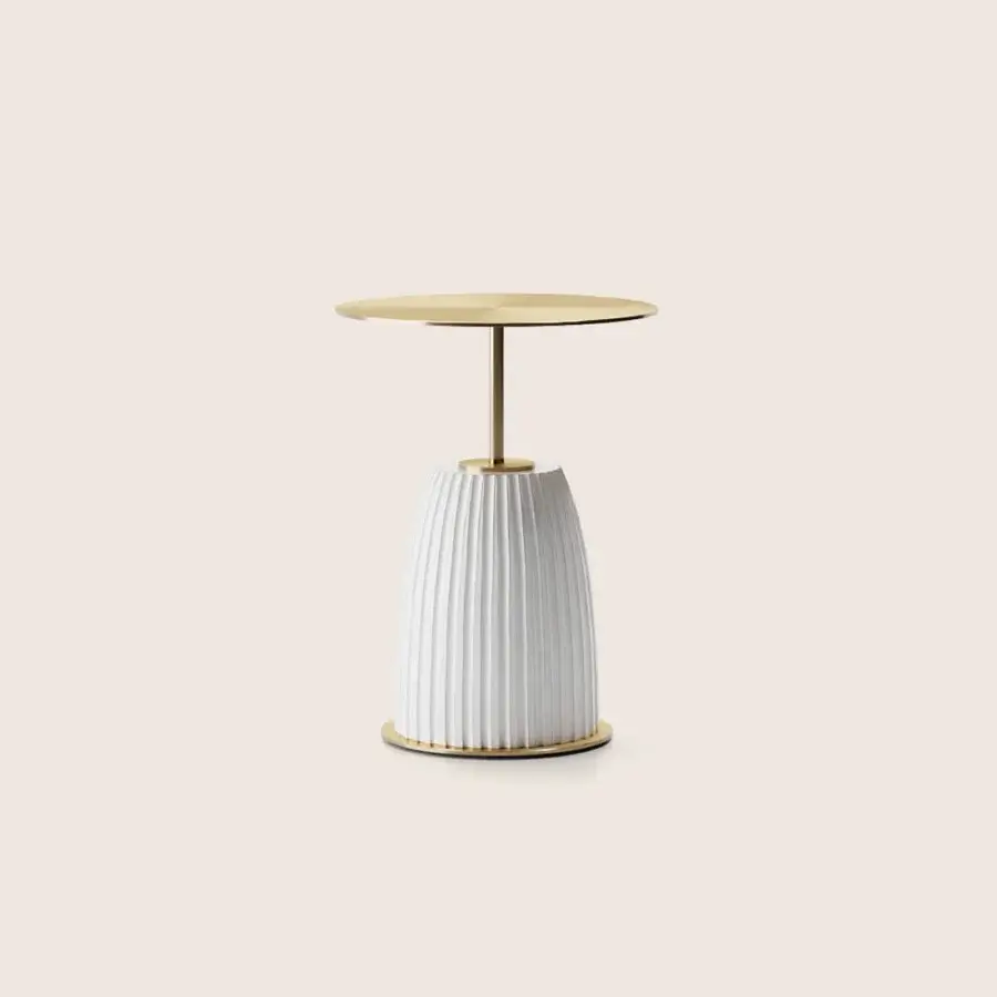Elegant Paolo Castelli Dione side table with sculptural fluted white gres base and brushed matt gold metal top silhouette