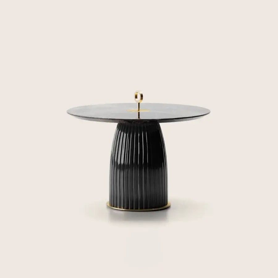 Sophisticated Paolo Castelli Dione side table featuring dark stone top, fluted cylinder base, gold trim, stem, ring handle