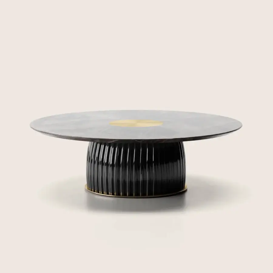 Luxury Paolo Castelli Dione side table with glossy dark grey stone top, satin golden disc and fluted ceramic base finish