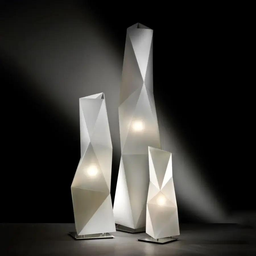 Elegant Slamp Diamond floor lamp with geometric form in translucent matte synthetic material creating ambient light