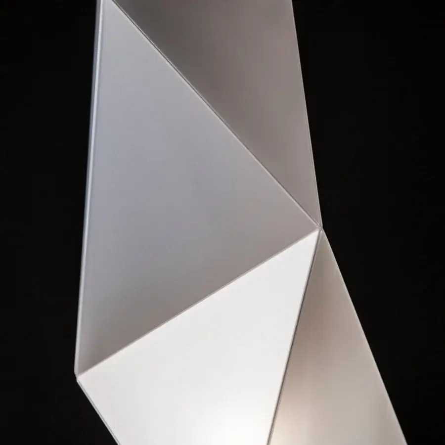Superior Slamp Diamond lamp with geometric form crafted in matte white synthetic material creating dynamic light play