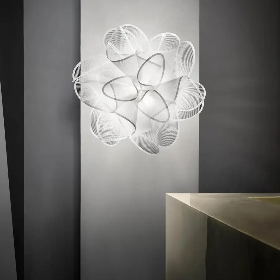 Superior Slamp La Belle Étoile wall lamp handcrafted in Italy with white and gray texturally-printed transparent materials radiating soft glow