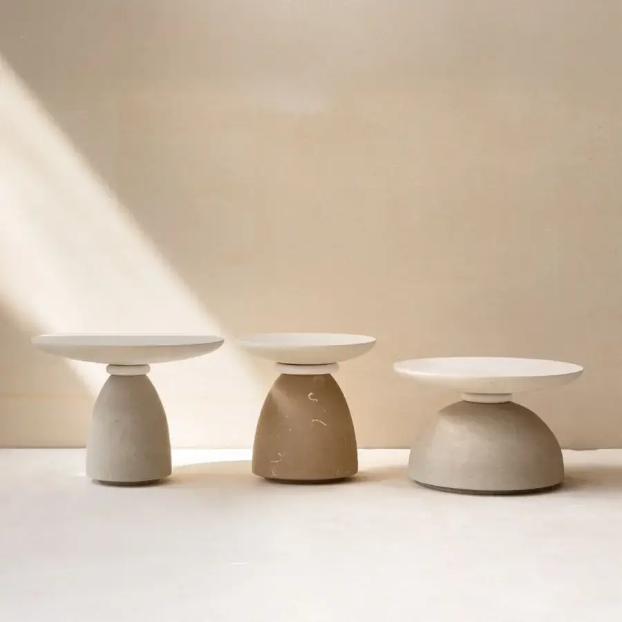Luxury Apospersano Contemporary Geo coffee table crafted from stone featuring matte textured finish in neutral beige tones