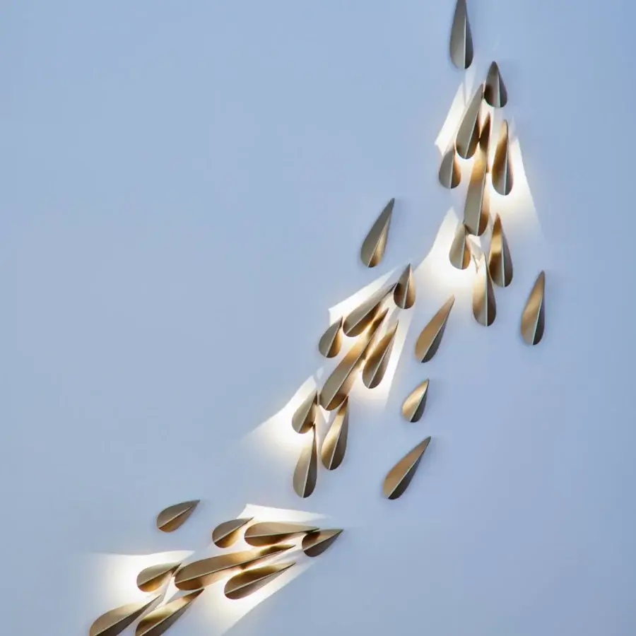 Exquisite Paolo Castelli Anodine wall lamp with organic metal elements in satin gold finish