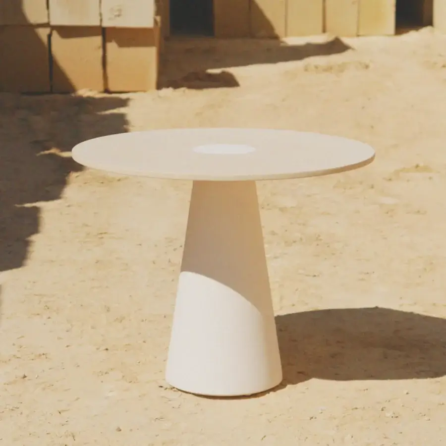 Sophisticated PIMAR Centro coffee table crafted from natural stone with a honed surface finish and conical pedestal base