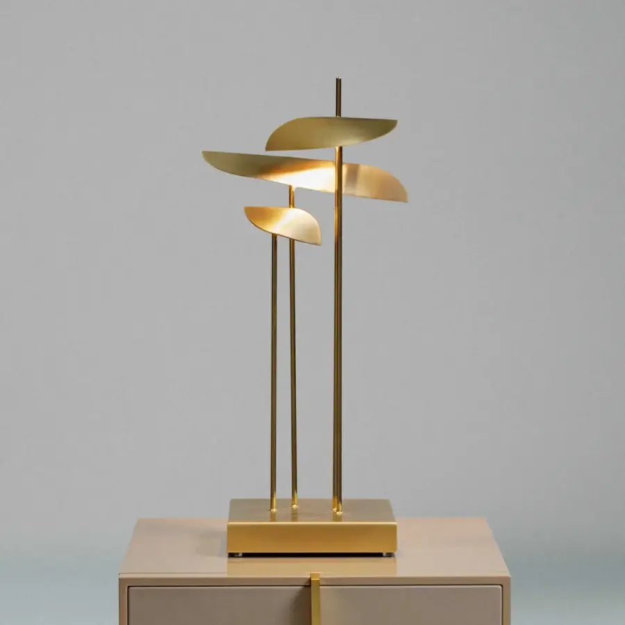 Exquisite handcrafted Paolo Castelli Anodine table lamp featuring brass stems, base, and leaf shaped metal elements