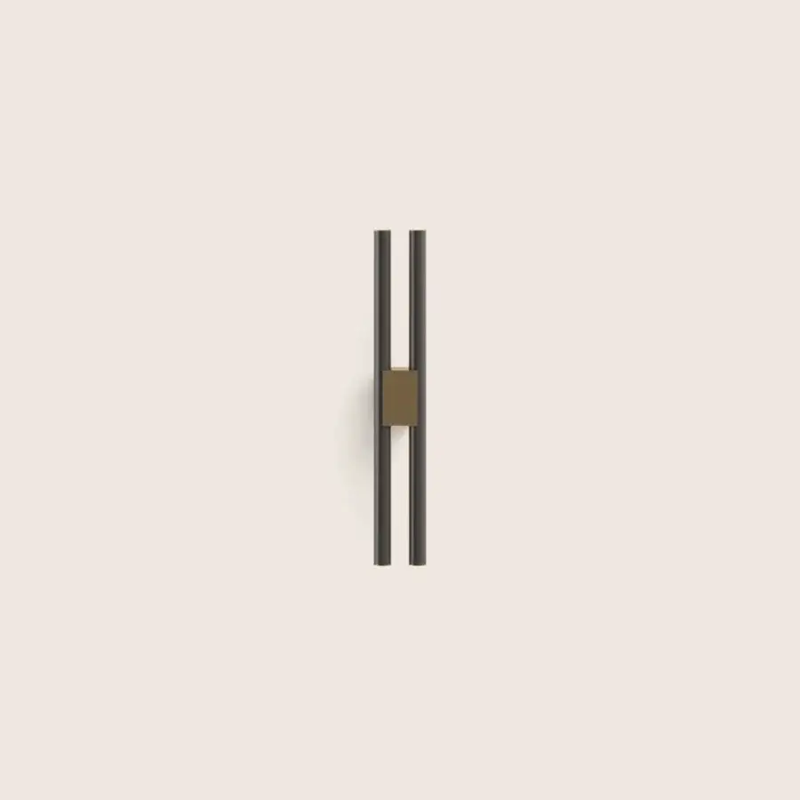 Exquisite Paolo Castelli Fair wall lamp with tubular metal and bronze brass structure in matt black finish