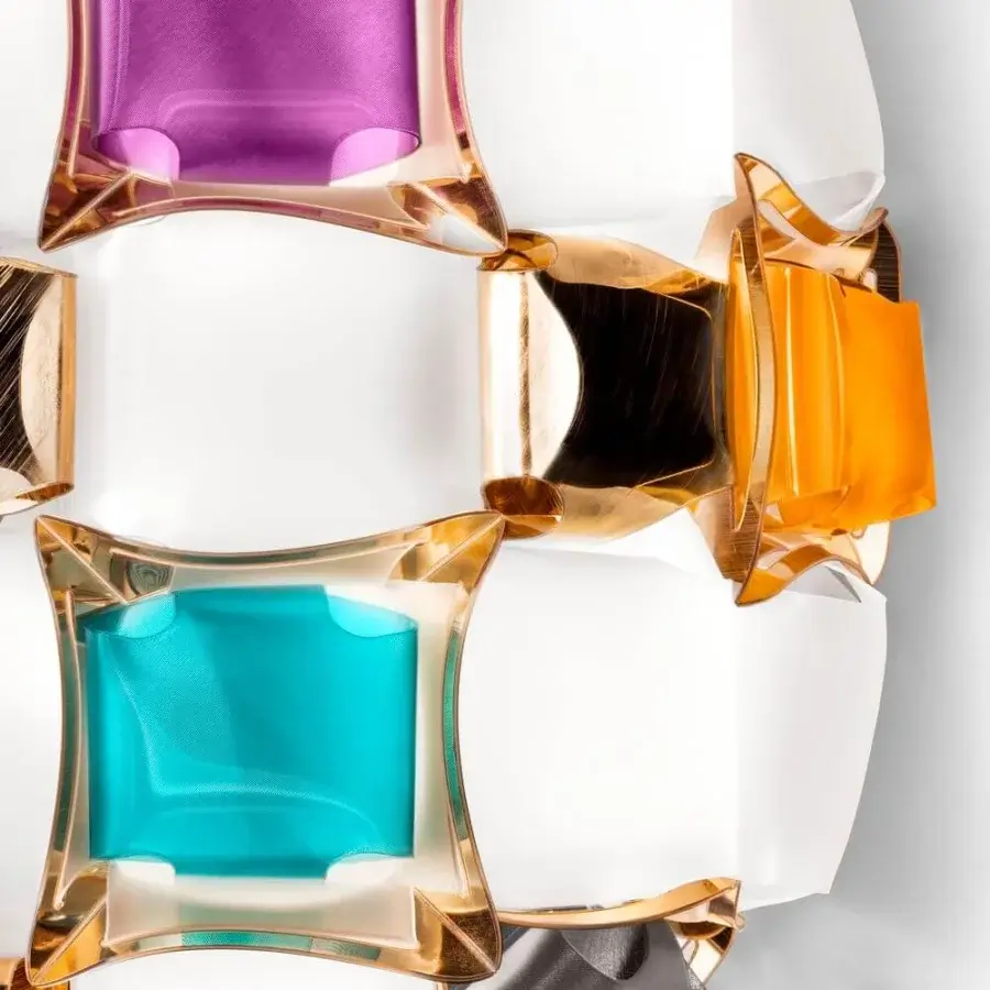 Exquisite Slamp Mida wall lamp crafted in white Opalflex® and printed Lentiflex® with polished teal, purple, gold, black, and orange cabochons