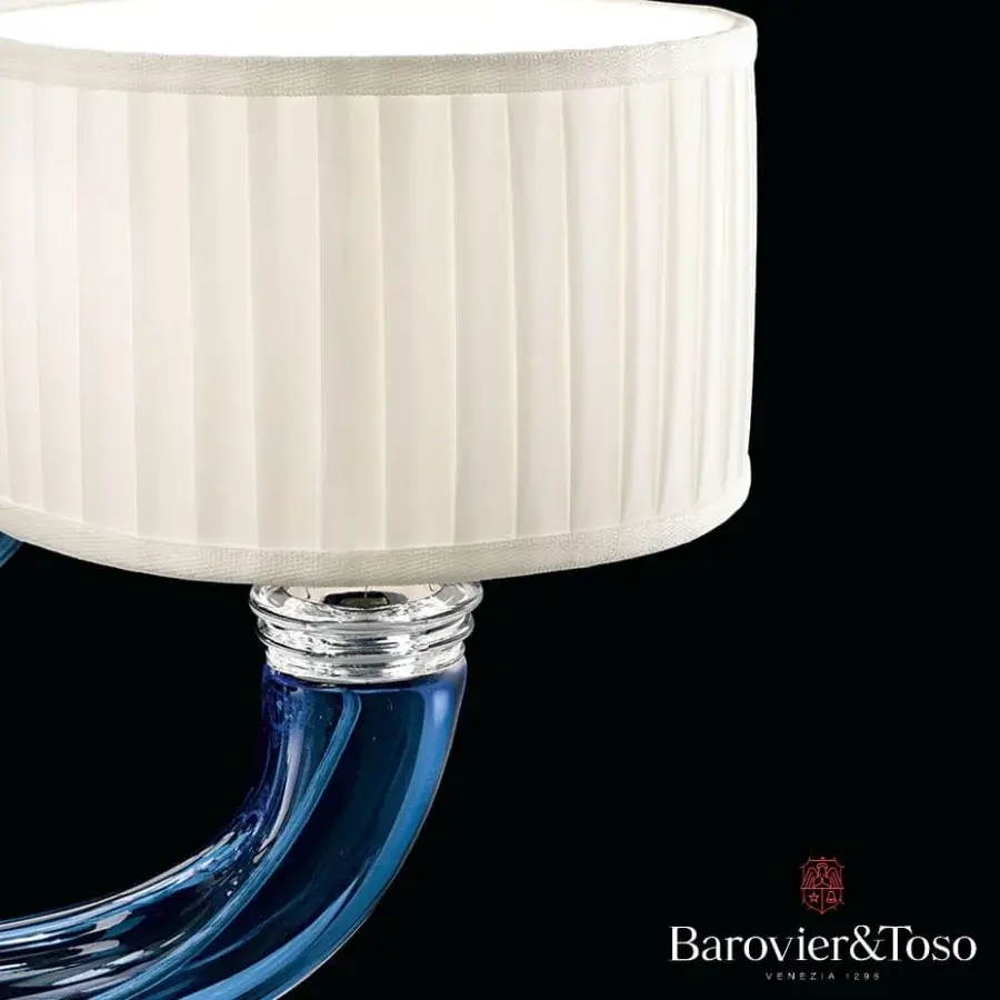 Elegant Barovier&Toso Alexandria wall lamp in off-white pleated fabric with a swirling blue glass arm and clear glass connections