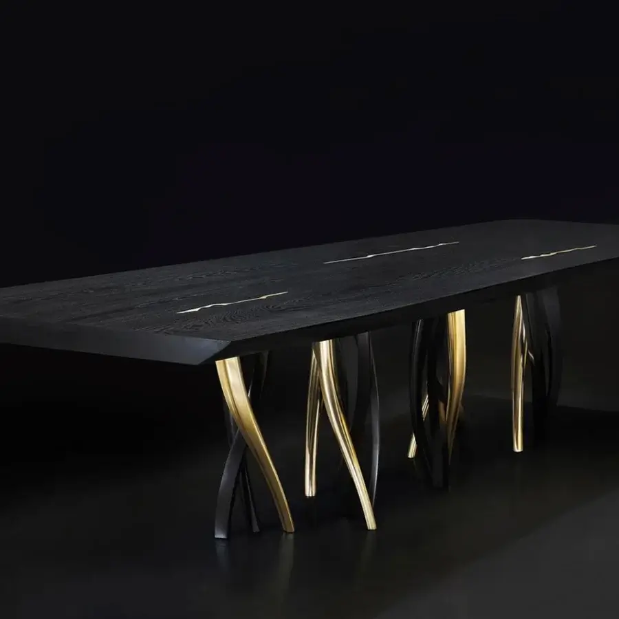 Sophisticated Il Pezzo 8 table crafted with black stained oak and lustrous gold finish inlays supporting aluminum casting legs
