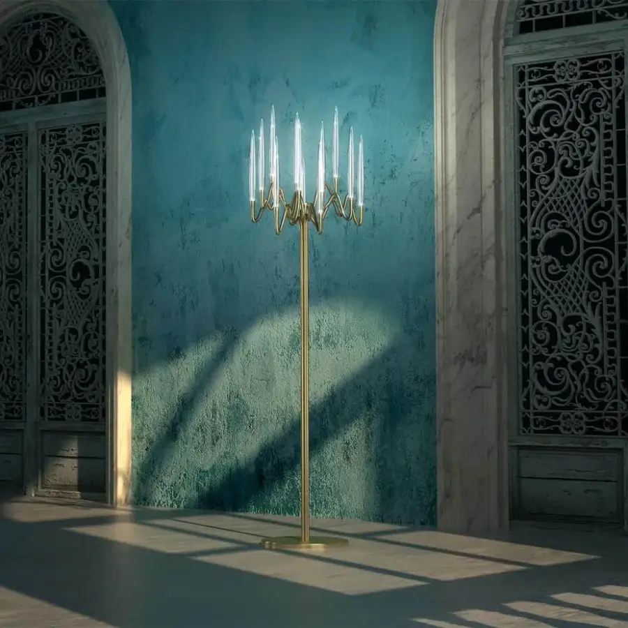 Exceptional Il Pezzo Mancante Il Pezzo floor lamp crafted with hand-forged brass and clear solid crystal emitting a golden glow
