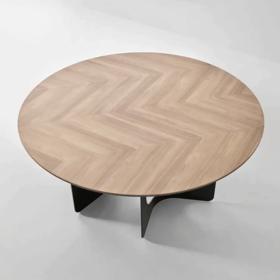 Elegant Modesign Hole table with circular light brown wood chevron tabletop in matte finish and dark curved panels