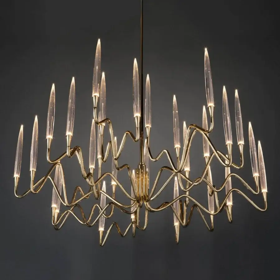 Lavish Il Pezzo Mancante chandelier built with hand-forged brass and clear solid crystal illuminated with glossy gold finish