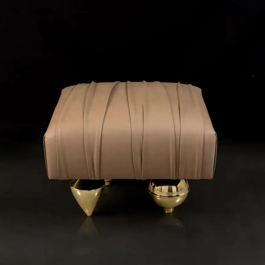Lavish Il Pezzo Mancante Il Pezzo 1 ottoman in light tan leather showcasing gathered detailing with refined sand brass casting feet