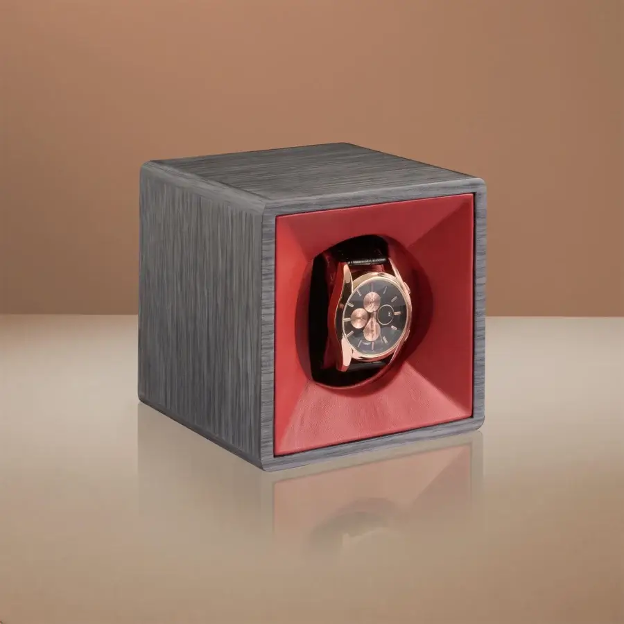 Luxury Agresti Tempo Unico watch winder in wood with textured grey grain finish and vibrant red synthetic inner lining