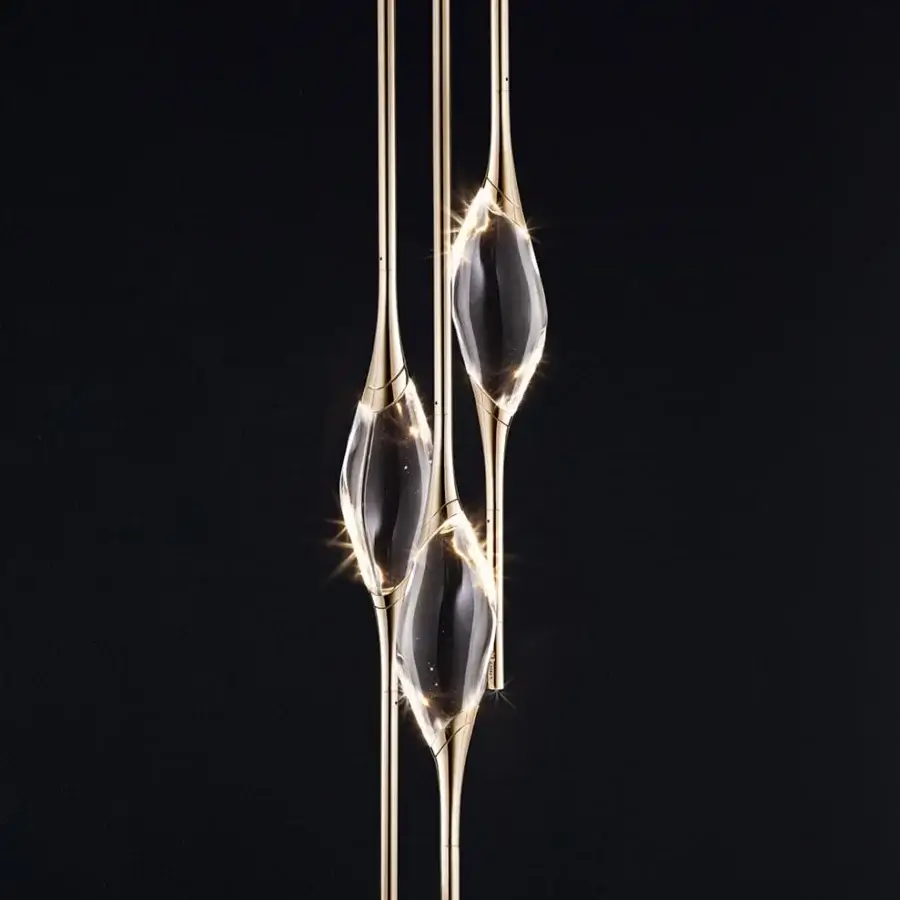 Superior Il Pezzo 12 lamp with three clear crystal diffusers and refined brass stems finished in gold with copper accents