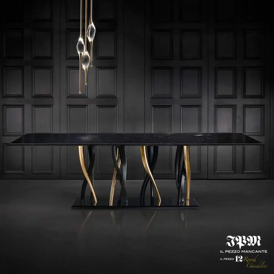 Distinguished Il Pezzo 12 suspension lamp with four clear crystal elements and thin golden brass stems illuminating integrated LEDs