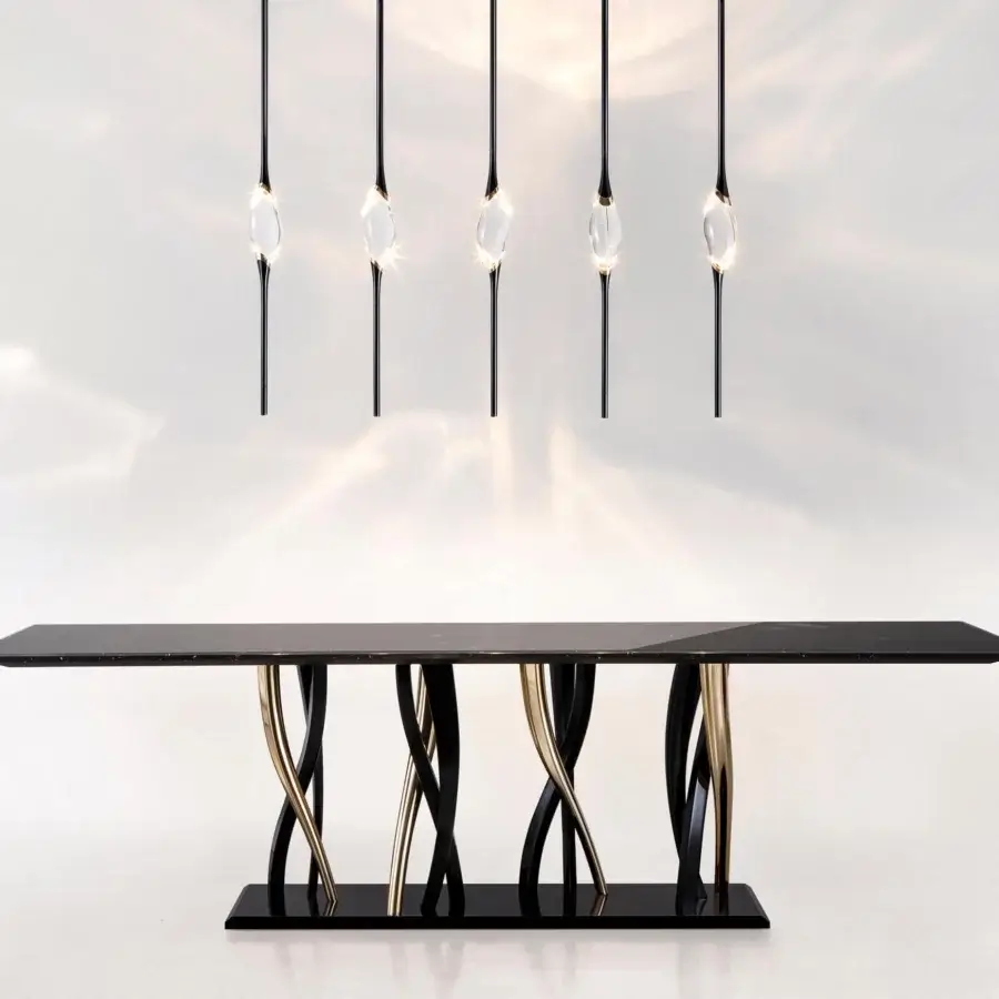 Distinguished Il Pezzo Mancante Il Pezzo 12 suspension lamp with a female figure carrying light within clearest crystal and refined dark brass stems