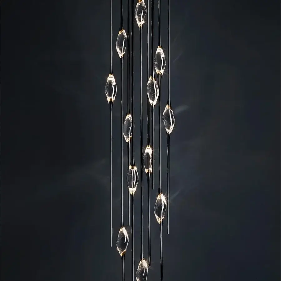Exclusive Il Pezzo Mancante Il Pezzo 12 suspension lamp crafted in clear crystal with sleek brass stems and glossy dark finish