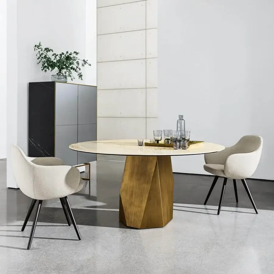 Superior Sovet Italia Cadira armchair with light beige textile upholstery and lacquered dark metal coned legs