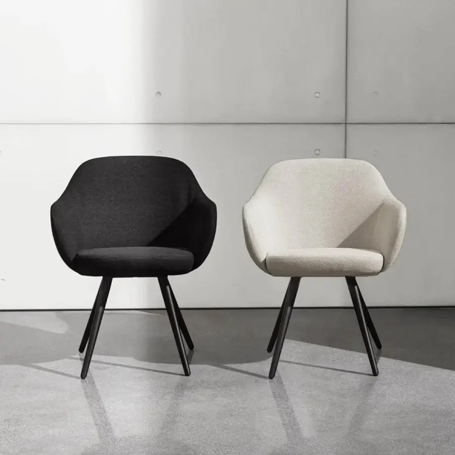 Distinguished Sovet Italia Cadira armchair with light beige textile upholstery and matte black lacquered metal legs