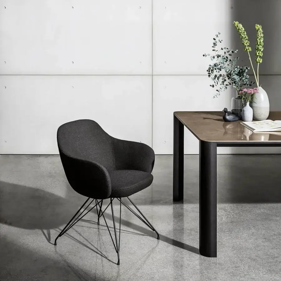 Elegant Sovet Italia Cadira armchair with dark gray textile upholstery and black lacquered metal wire base