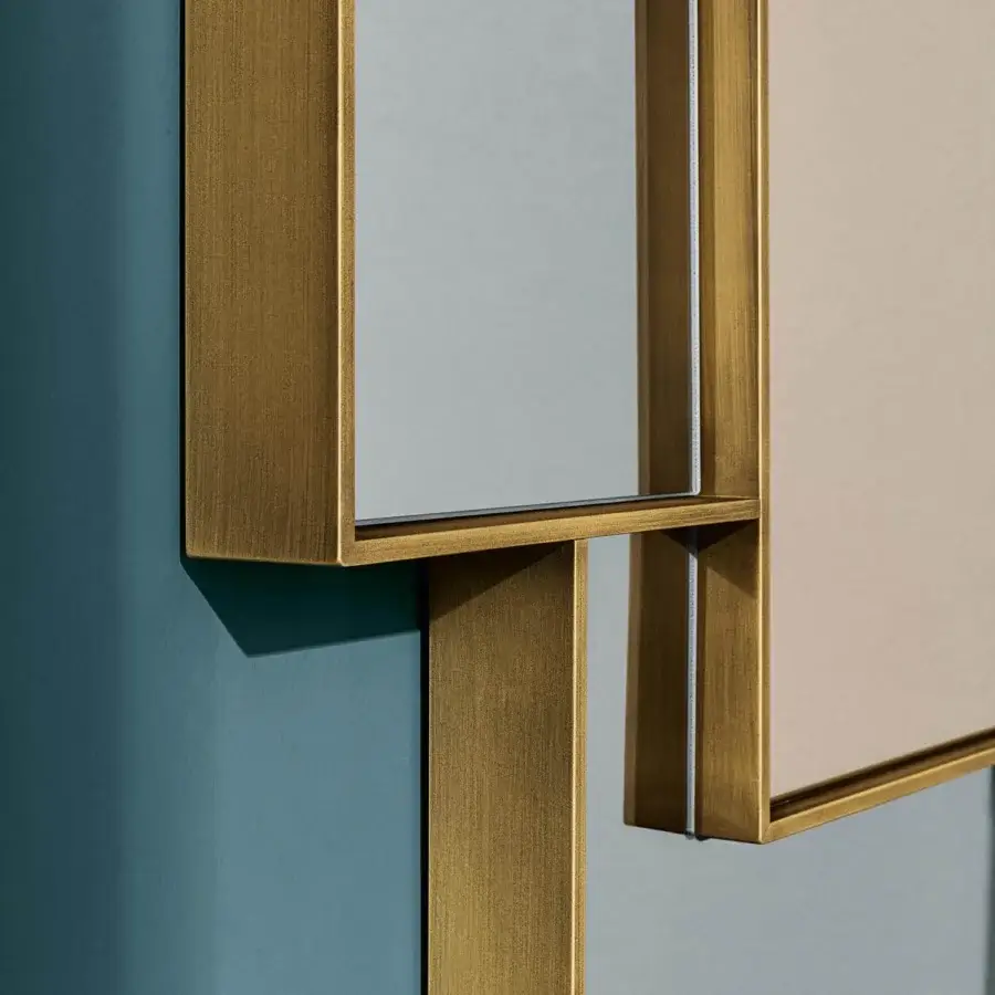 Elegant Sovet Italia Combi mirror with intersecting geometric shapes crafted in lacquered aluminum with burnished brass finish