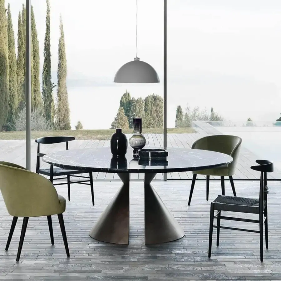 Elegant Presotto Nimbo table with a polished black and white marble top and matte metallic lacquer half-cone base