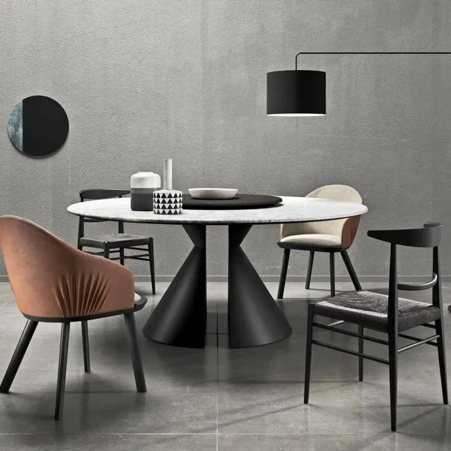 Distinguished Presotto Nimbo table with a round marble tabletop and dark matte-lacquered half-cone base crafted in Italy