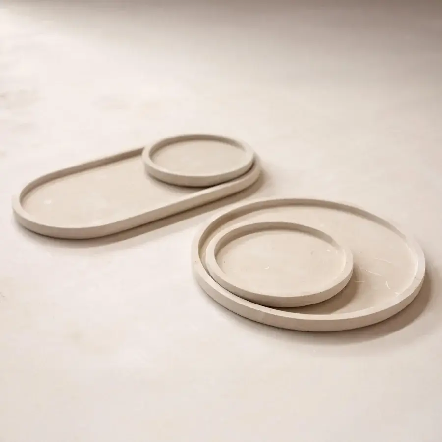 Elegant Pimar Messapo decorative tray in off-white natural stone with a monolithic low-profile and granular matte finish