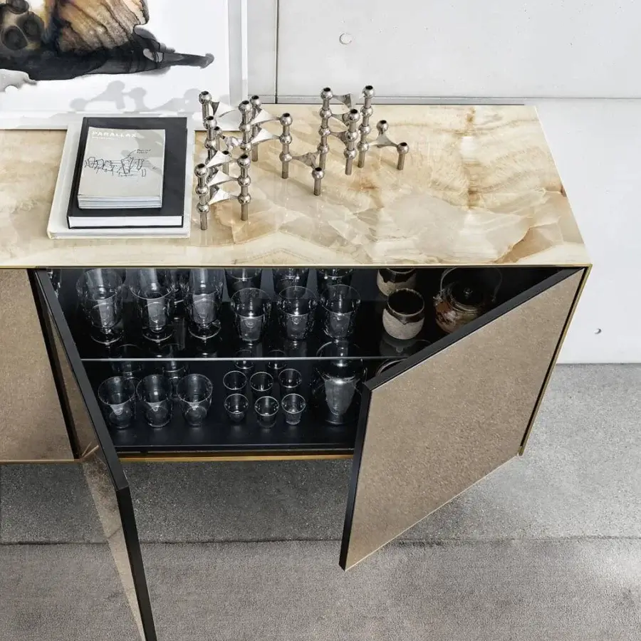 Lavish Sovet Italia Magda sideboard with ceramic structure and mirrored doors, built with a brass profile and embossed black lacquered metal base