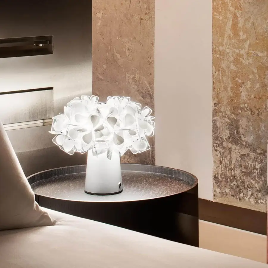 Superior Slamp Clizia Battery lamp presenting a contemporary botanical design in translucent synthetic material with a smooth matte white base