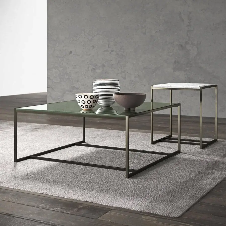 Elegant Presotto Eulero coffee table with bold geometric shapes in lacquered tubular metal and a refined glass tabletop with a matte finish