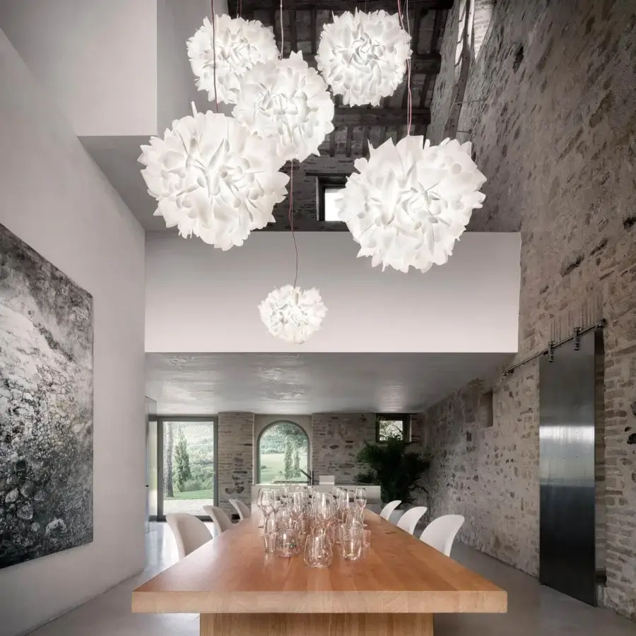 Elegant Slamp Veli Foliage suspension lamp in white with petal-like texture and red cord suspension