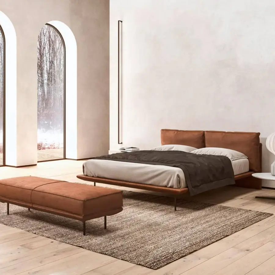 Elegant Presotto Cali bench with smooth light brown fabric upholstery and slim dark metal legs