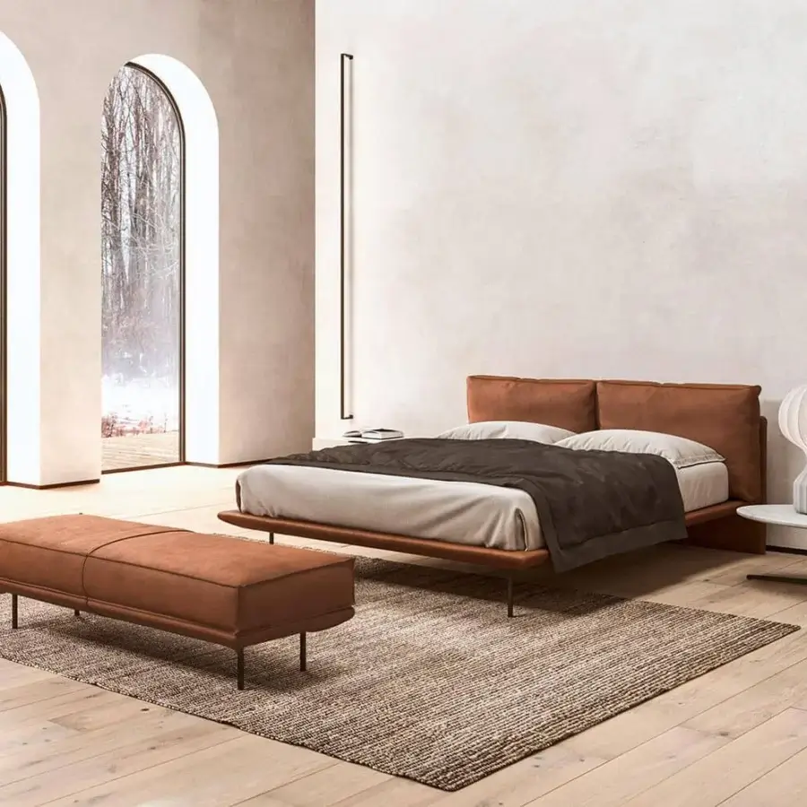 Superior Presotto Cali bed with warm brown fabric upholstery and thin dark metal legs for total lightness