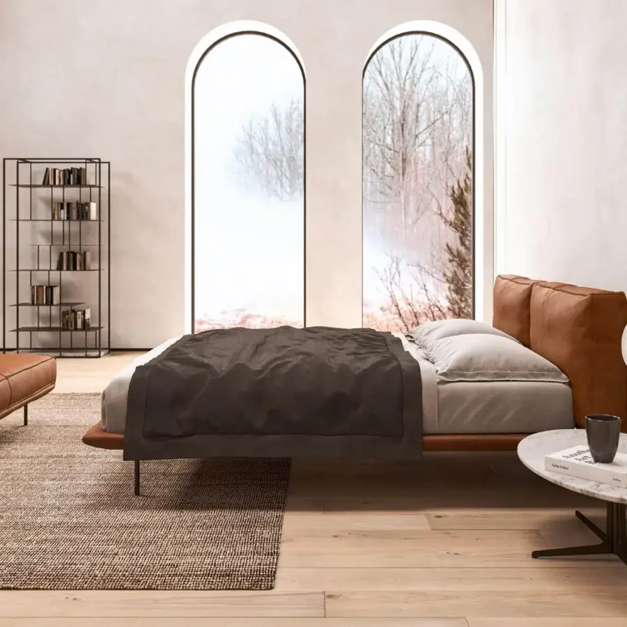 Distinguished Presotto Cali bed with tan leather or eco-leather upholstery and slim dark metal feet