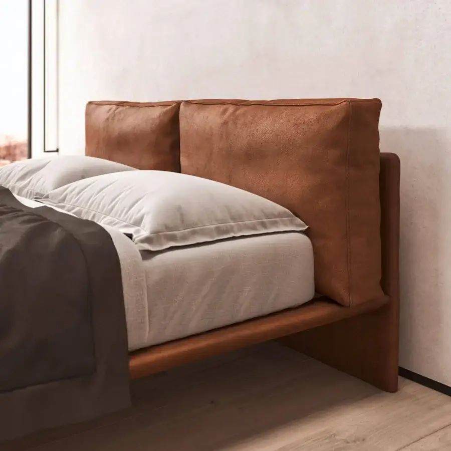 Elegant Presotto Cali bed with warm brown leather upholstery and slim metal feet crafted in Italy